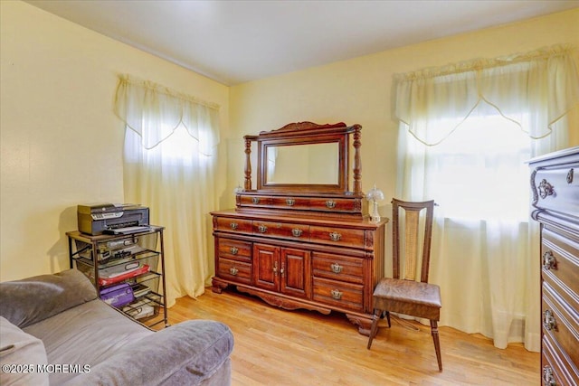 sitting room with light hardwood / wood-style flooring