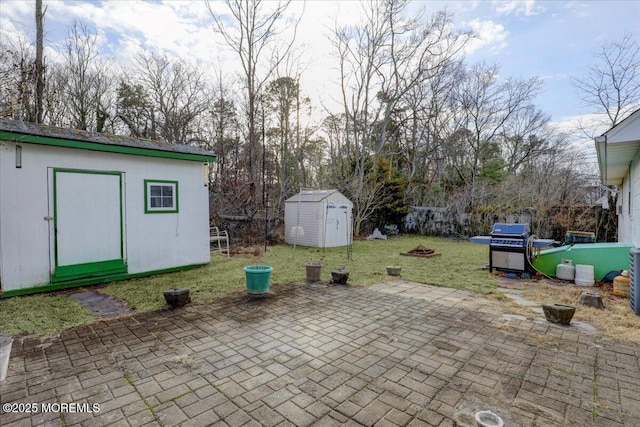 view of patio / terrace featuring a shed