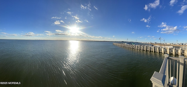 property view of water featuring a dock