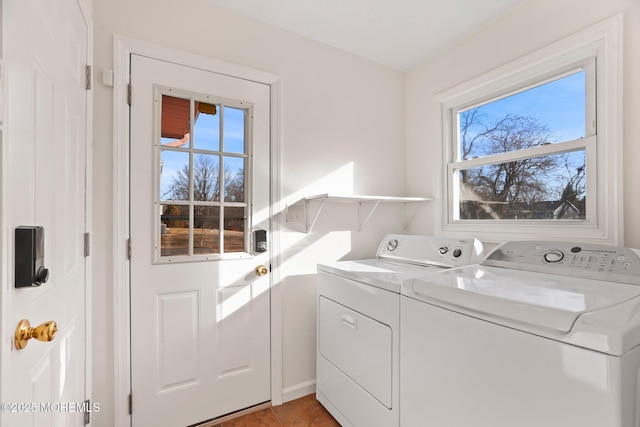 laundry area with independent washer and dryer