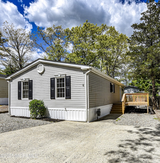 view of front of home with a deck