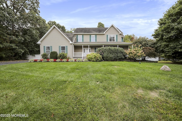 view of front of home featuring a porch and a front yard