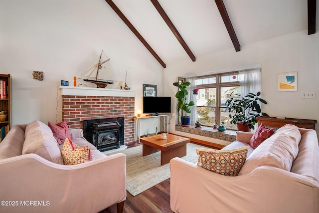 living room with wood-type flooring, high vaulted ceiling, a fireplace, and beam ceiling