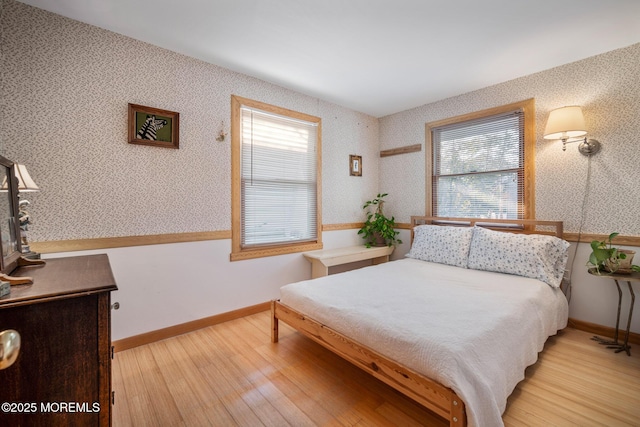 bedroom with light wood-type flooring