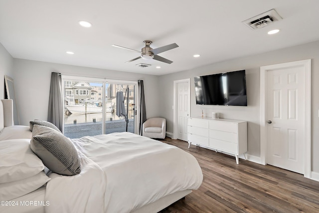 bedroom with ceiling fan, dark hardwood / wood-style flooring, and access to outside