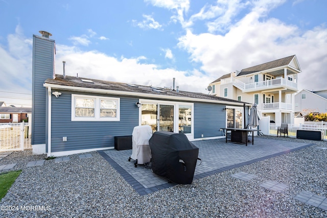 rear view of house with a patio area