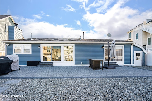 back of house featuring a patio