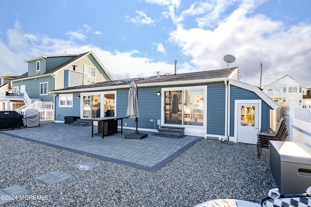 rear view of property with a patio