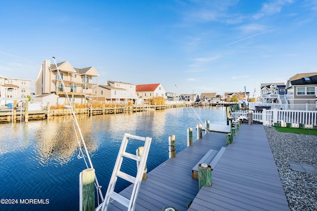 view of dock with a water view