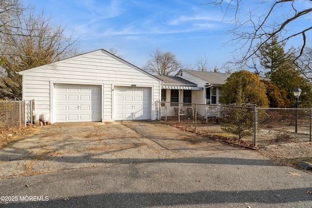 ranch-style house featuring a garage