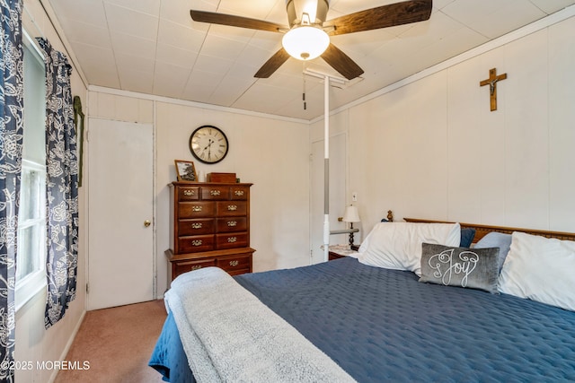 bedroom with ceiling fan and carpet flooring