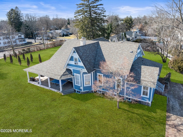 drone / aerial view featuring a residential view