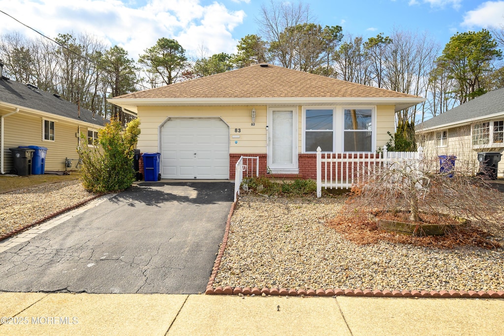 view of front of home featuring a garage