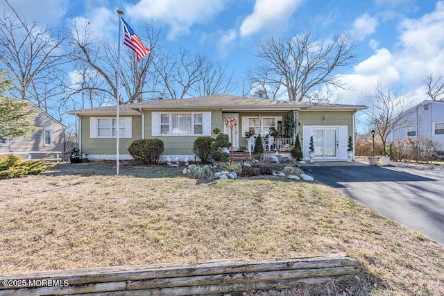 426 Shady Ln, Howell, NJ 07731 - view of front facade featuring a porch and a front yard