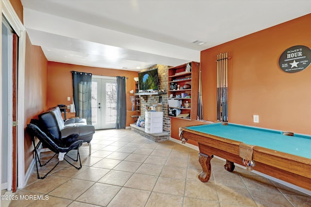 playroom featuring pool table, french doors, light tile patterned flooring, and visible vents