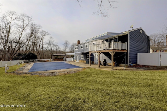 view of pool featuring a fenced in pool, a patio, a lawn, a gazebo, and fence