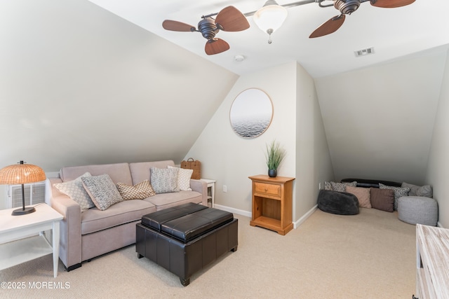 living room featuring light carpet, lofted ceiling, and ceiling fan