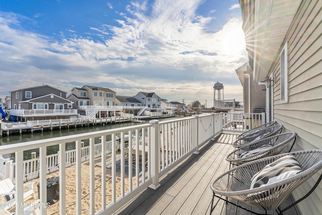 deck featuring a water view