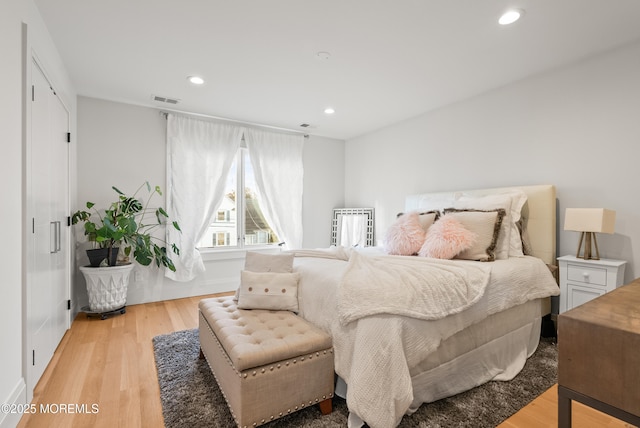 bedroom featuring light hardwood / wood-style floors