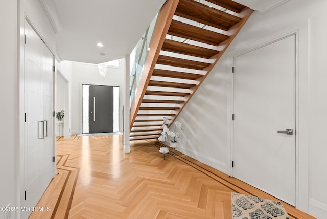 hallway with light parquet floors