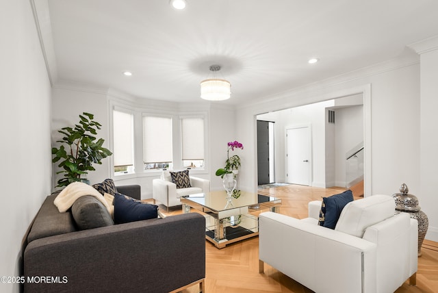 living room featuring crown molding and light parquet flooring