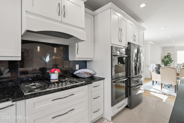 kitchen with white cabinetry and appliances with stainless steel finishes