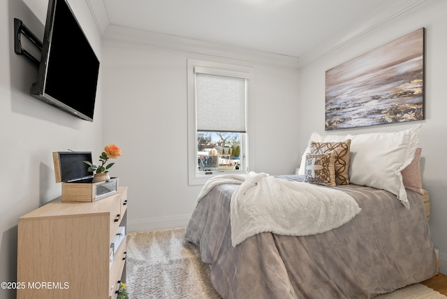 carpeted bedroom featuring crown molding