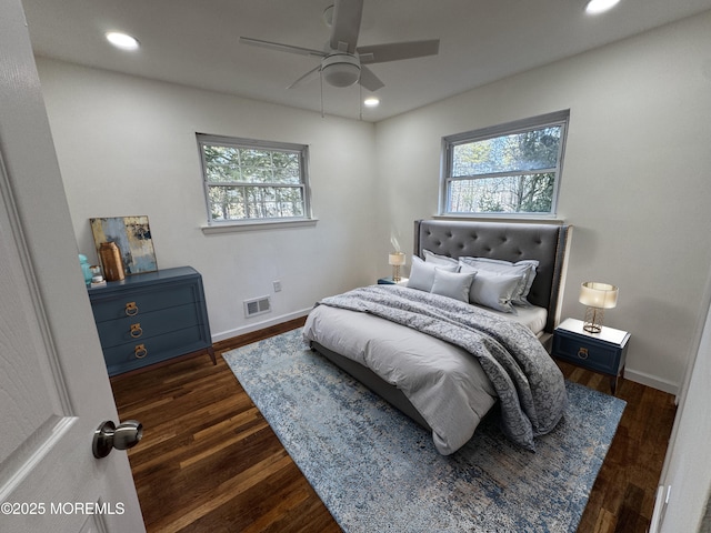 bedroom featuring dark wood-type flooring and ceiling fan