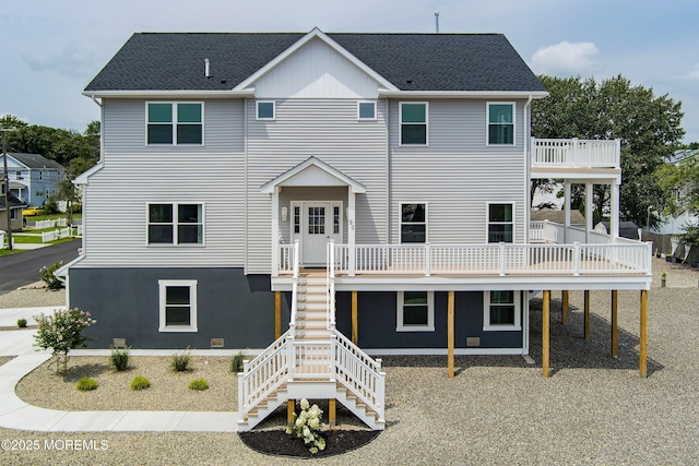 rear view of property with a deck