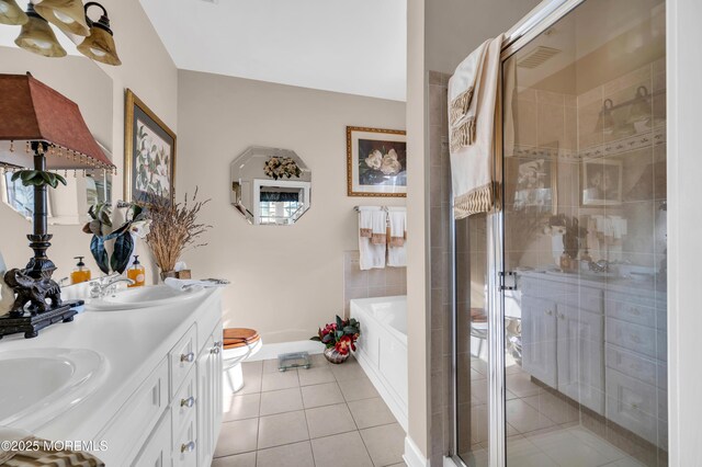 93 Golden Eye Ln, Port Monmouth, NJ 07758 - bathroom featuring a sink, tile patterned floors, a stall shower, and a bath