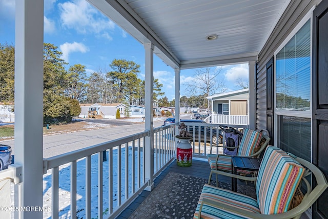 balcony featuring covered porch