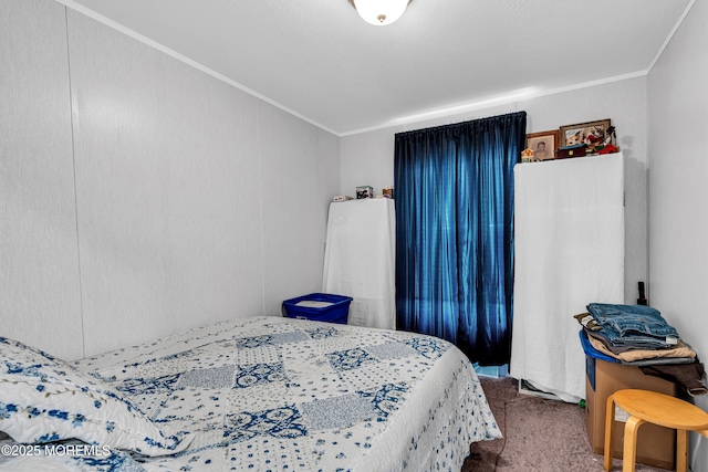 bedroom featuring crown molding and carpet flooring