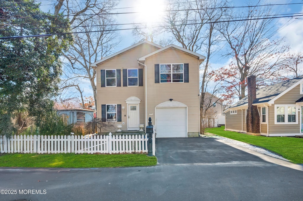 view of front of house with a garage