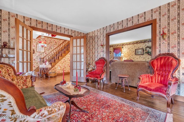 living area with hardwood / wood-style flooring