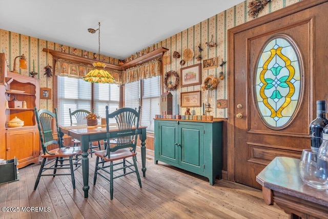 dining room with light wood-type flooring