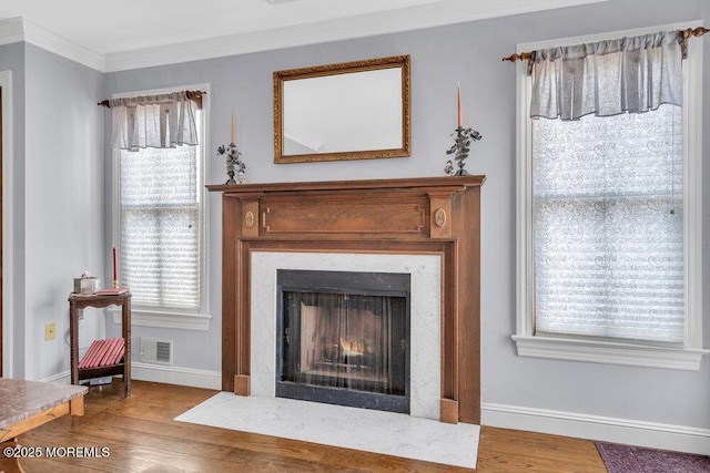 room details featuring ornamental molding and hardwood / wood-style floors