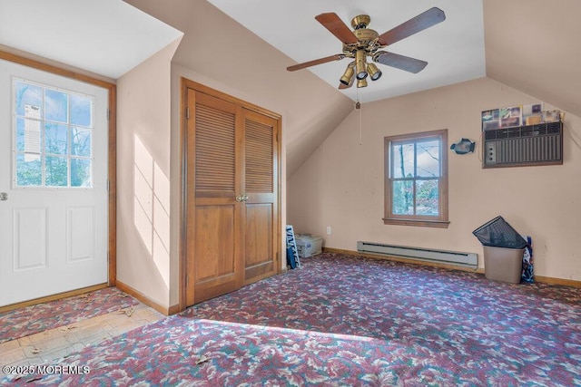 interior space featuring a wall mounted AC, vaulted ceiling, light carpet, ceiling fan, and a baseboard heating unit