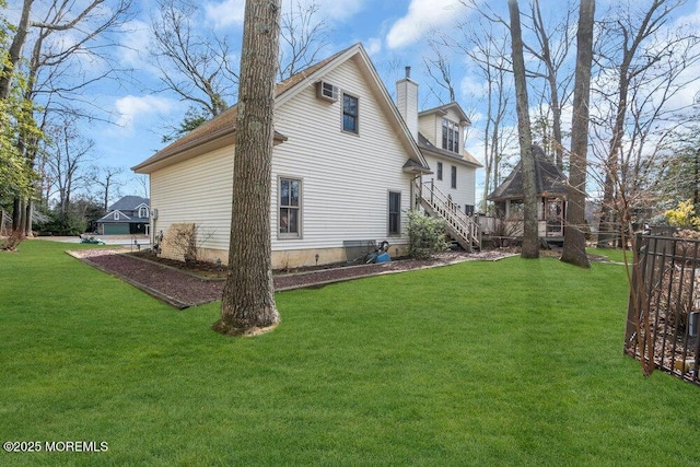 view of property exterior featuring a lawn