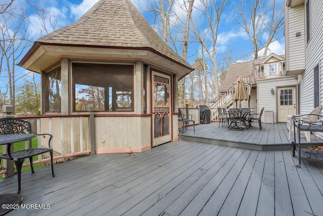 deck featuring a sunroom