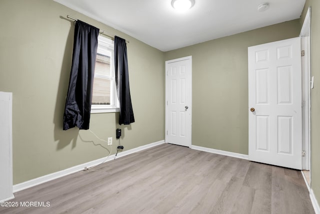 unfurnished bedroom featuring light hardwood / wood-style flooring