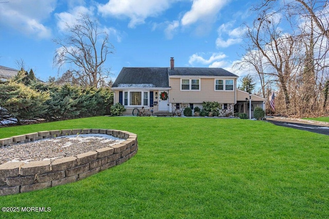 view of front of house with a front lawn