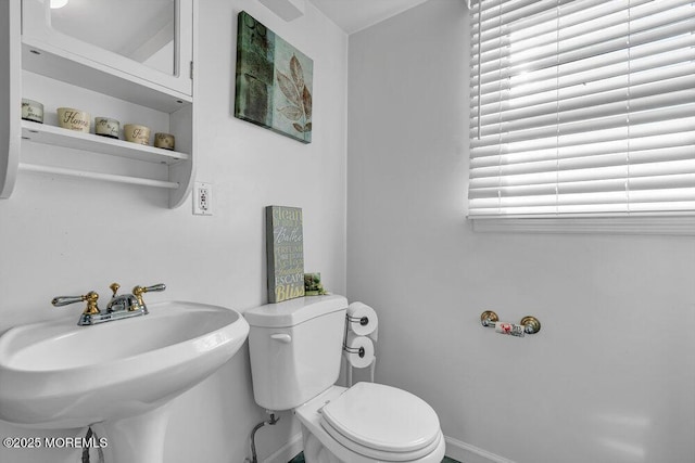 bathroom with sink and toilet