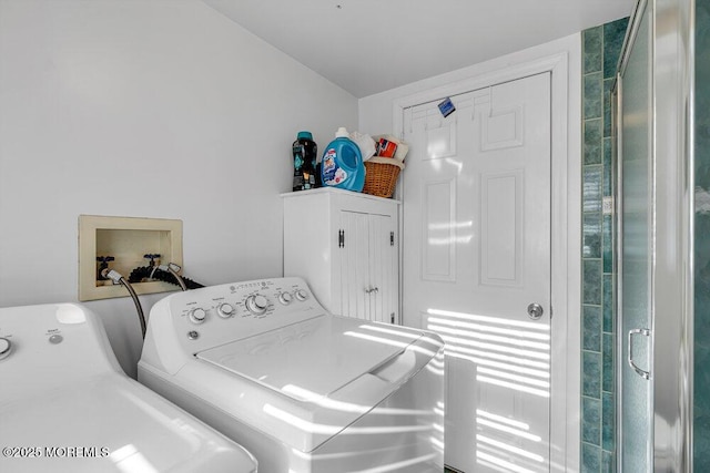 laundry room with washer and clothes dryer