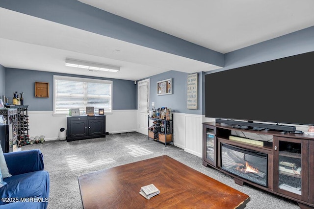 living room with light colored carpet