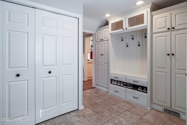 mudroom featuring light tile patterned flooring