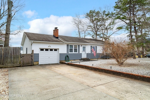 single story home featuring a garage