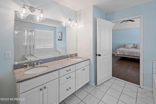 bathroom with vanity and an enclosed shower