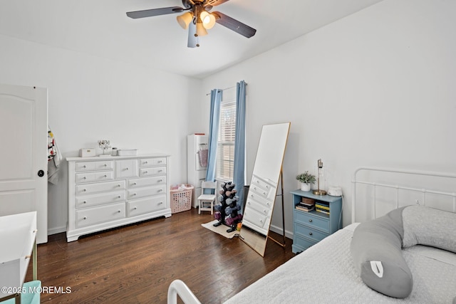 bedroom featuring ceiling fan and dark hardwood / wood-style flooring