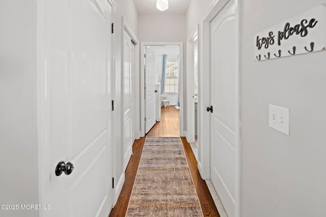 hall featuring hardwood / wood-style flooring