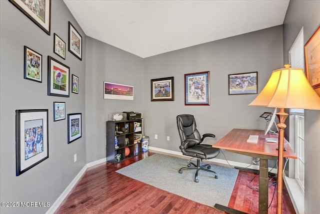 office space with dark wood-type flooring